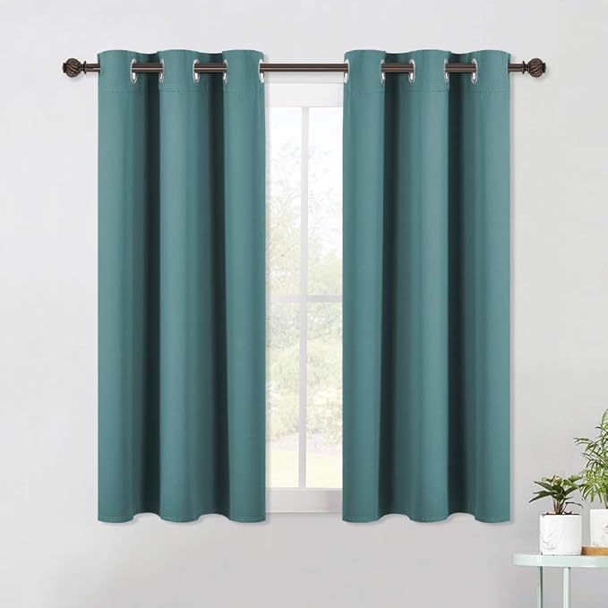 NICETOWN Living Room Window Curtain Panels, Thermal Insulated Solid Grommet Blackout Draperies/Drapes (Sea Teal, 1 Pair, 42 by 54-Inch)