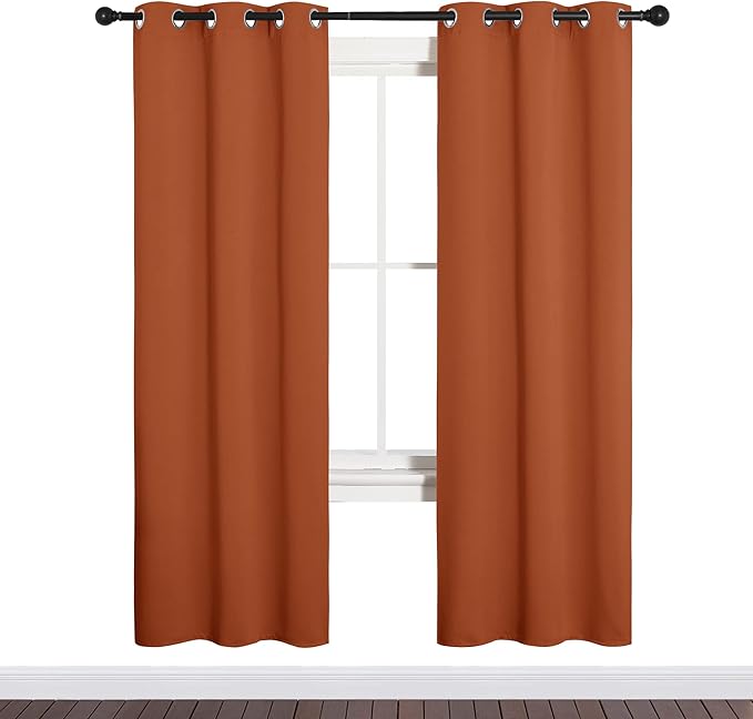 NICETOWN Blackout Curtain Panels for Girls Room, Nursery Essential Thermal Insulated Solid Grommet Top Blackout Drapes (Burnt Orange, 1 Pair, 34 x 72 inches)