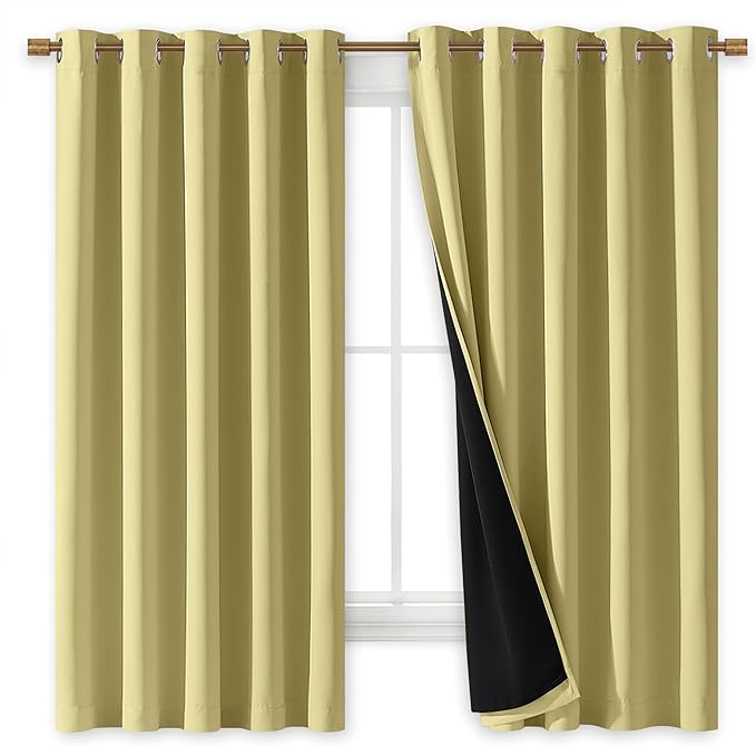 NICETOWN 100% Blackout Curtains with Black Liners, Thermal Insulated Full Blackout 2-Layer Lined Drapes, Energy Efficiency Window Draperies for Bedroom (Paler Yellow, 2 Panels, 70-inch W by 63-inch L)