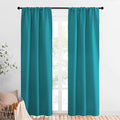 NICETOWN Peacock Blue Blackout Curtains Panels for Window, Thermal Insulated Rod Pocket Blackout Drapes/Draperies for Living Room (2 Panels, W34 x L84 inches)