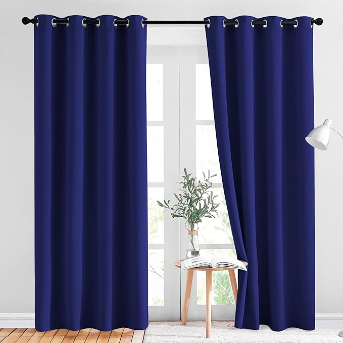 NICETOWN Blackout Curtain Panels 84 - Window Treatment Energy Saving Thermal Insulated Solid Grommet Blackout Drapes for Living Room (Navy Blue， 1 Pair， 52 by 84-Inch)