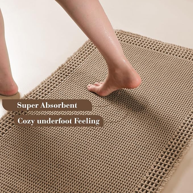 RESARE Waffle Bath Mat for Bathroom, Super Absorbent Bathroom Rugs Non Slip Machine Washable, Ultra Soft Quick Dry Boho Bath Rugs with Tassels for Floor, Upgraded Bordered Design, 24"x36" Brown